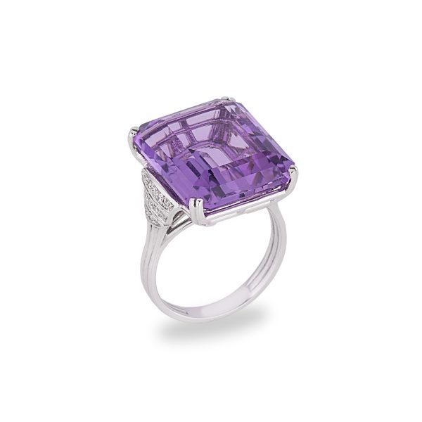 Emerald cut center stone ring